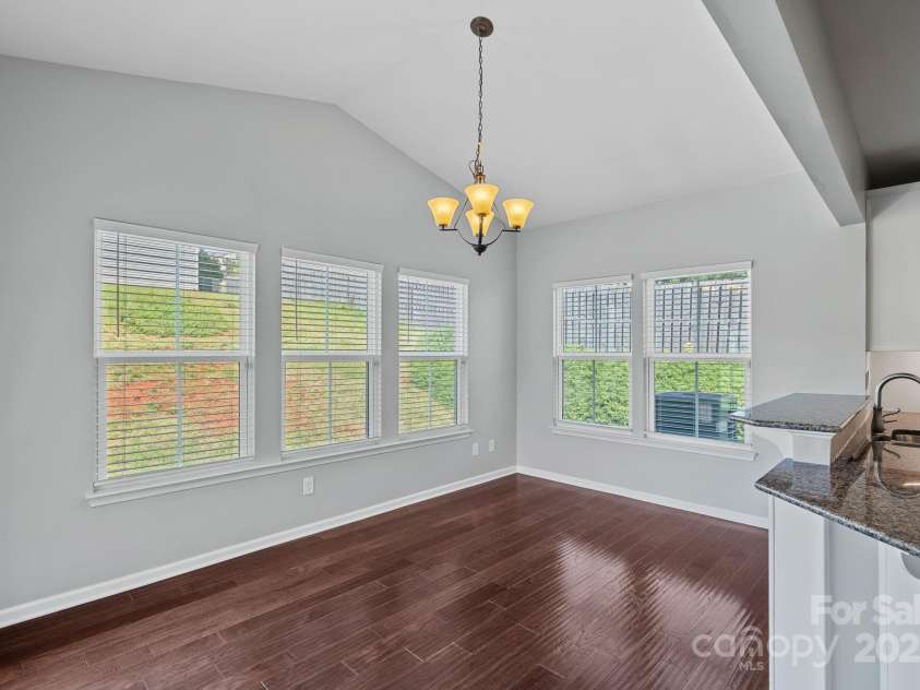 321 Almora Loop, Mooresville, NC 28115.  MLS# CAR4269481, YatesRealty ID 22755. This large dining area was a builder upgrade!