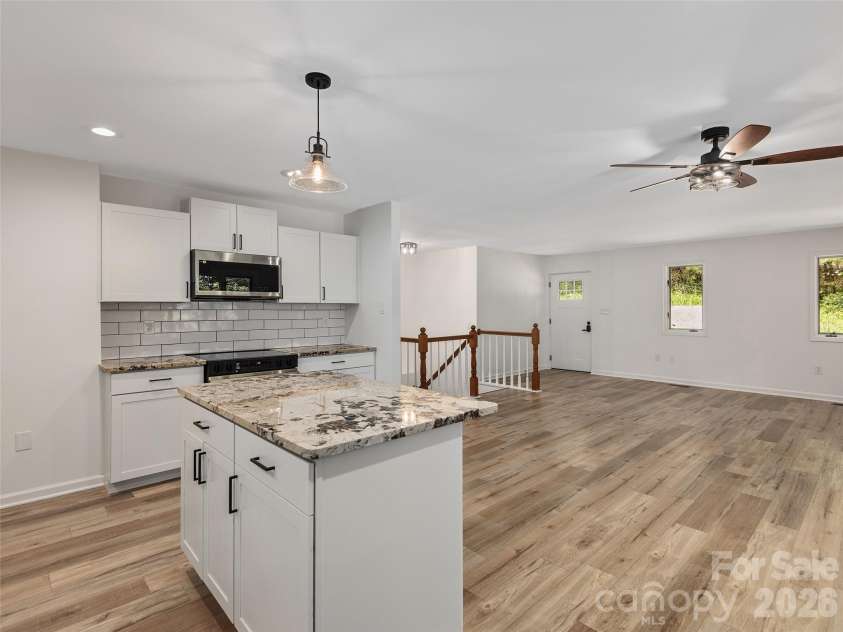 209 Ivy Hill Road, Hendersonville, NC 28792.  MLS# CAR4376204, YatesRealty ID 22760. Kitchen-looking toward front door