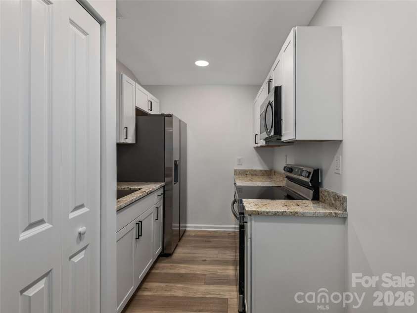 209 Ivy Hill Road, Hendersonville, NC 28792.  MLS# CAR4376204, YatesRealty ID 22760. Lower Level Kitchen