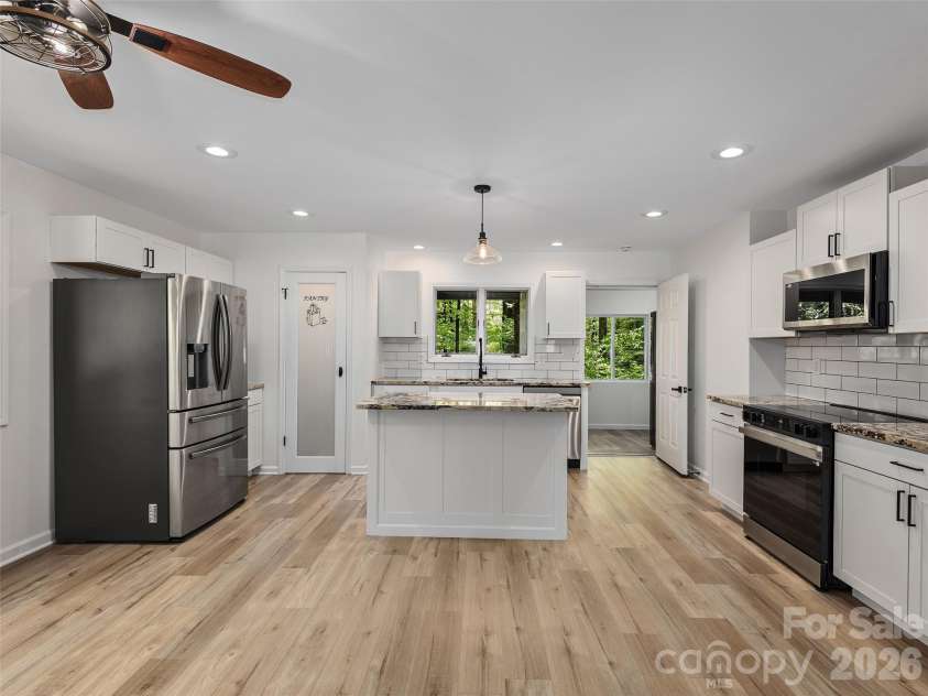 209 Ivy Hill Road, Hendersonville, NC 28792.  MLS# CAR4376204, YatesRealty ID 22760. Main level Kitchen