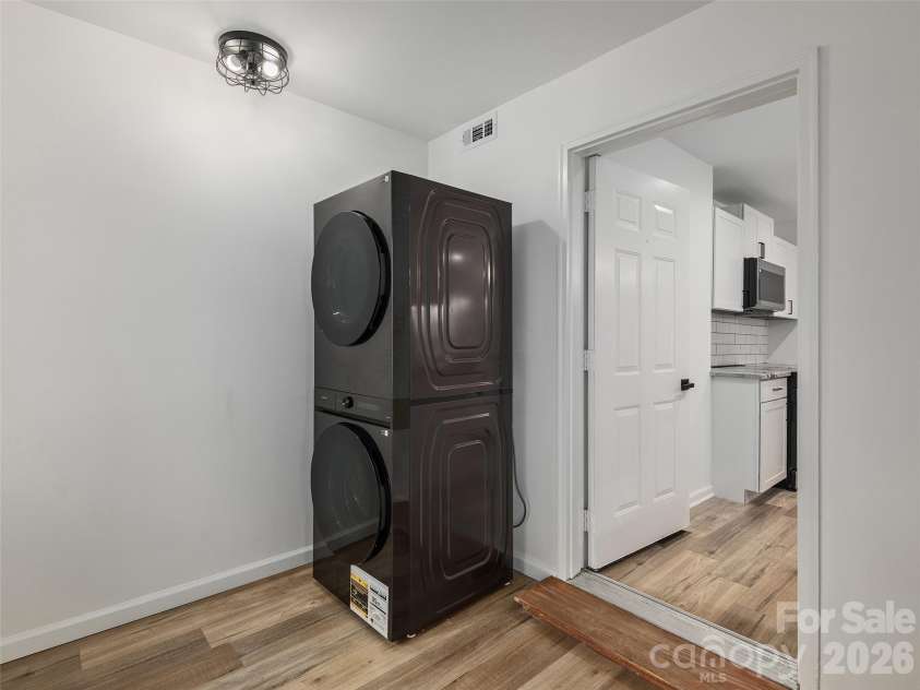 209 Ivy Hill Road, Hendersonville, NC 28792.  MLS# CAR4376204, YatesRealty ID 22760. Main Level Laundry Room