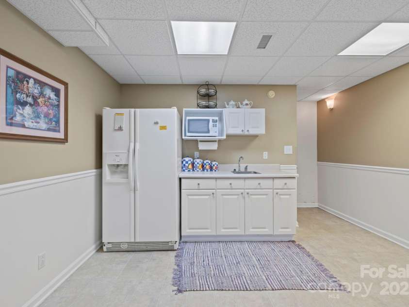 741 Zelda Court, Hendersonville, NC 28792.  MLS# CAR4275161, YatesRealty ID 22761. Kitchenette in walk out basement
