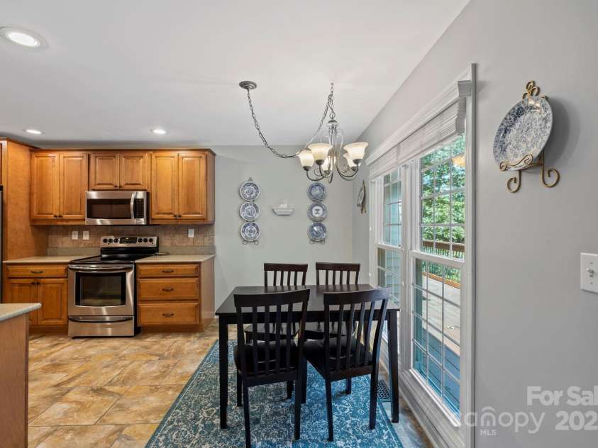 741 Zelda Court, Hendersonville, NC 28792.  MLS# CAR4275161, YatesRealty ID 22761. Main floor eat in kitchen