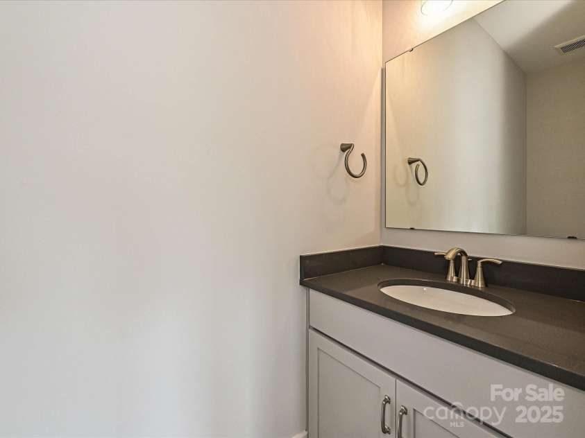1312 Walter Taylor Way, Charlotte, NC 28206.  MLS# CAR4207731, YatesRealty ID 22762. Rec Room Powder Room
