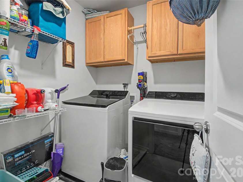 33 Cedar Hill Road, Hendersonville, NC 28792.  MLS# CAR4366130, YatesRealty ID 22762. Laundry Upper Level