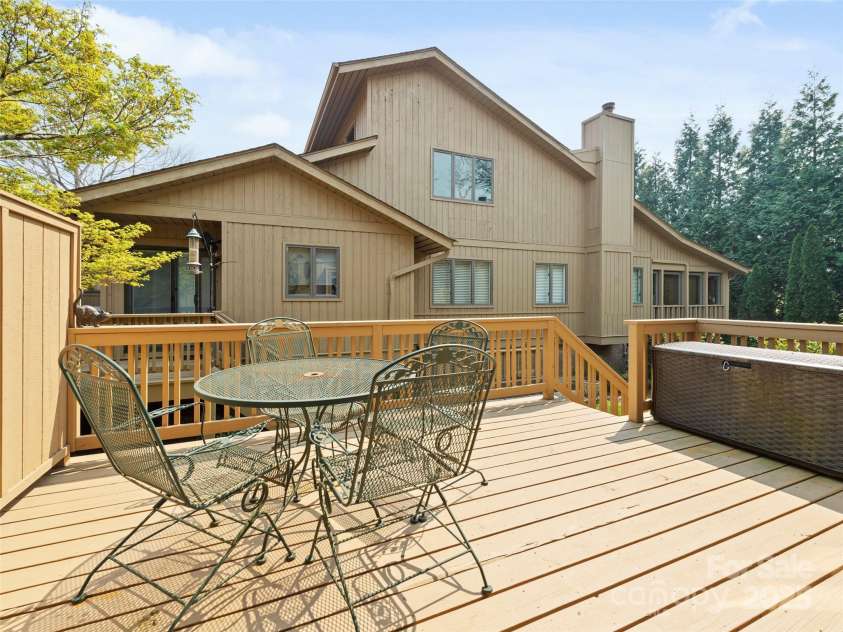 205 Wild Oak Lane, Hendersonville, NC 28791.  MLS# CAR4240419, YatesRealty ID 22765. Deck off Breakfast Room and Kitchen