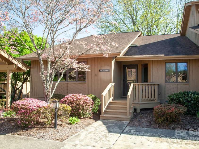 205 Wild Oak Lane, Hendersonville, NC 28791.  MLS# CAR4240419, YatesRealty ID 22765. End Unit in lower level part of The Oaks