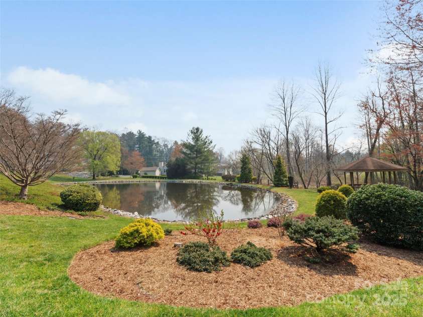 205 Wild Oak Lane, Hendersonville, NC 28791.  MLS# CAR4240419, YatesRealty ID 22765. Neighborhood Pond