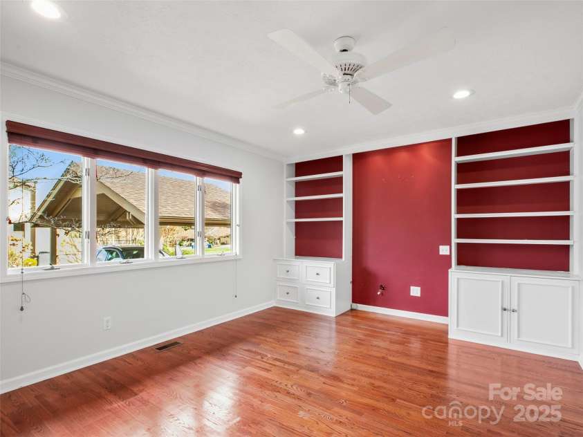 205 Wild Oak Lane, Hendersonville, NC 28791.  MLS# CAR4240419, YatesRealty ID 22765. Study/Office with more built ins off Breakfast Room