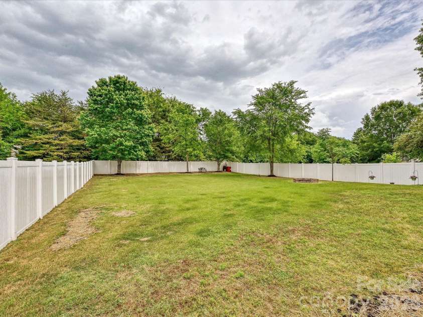 8007 Magna Lane, Indian Trail, NC 28079.  MLS# CAR4379280, YatesRealty ID 22765. Backyard