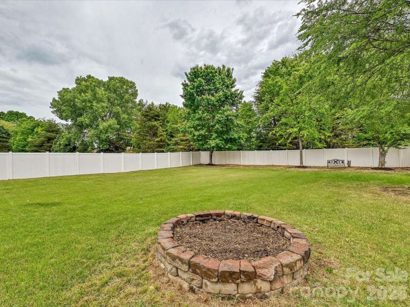 8007 Magna Lane, Indian Trail, NC 28079.  MLS# CAR4379280, YatesRealty ID 22765. Fire Pit