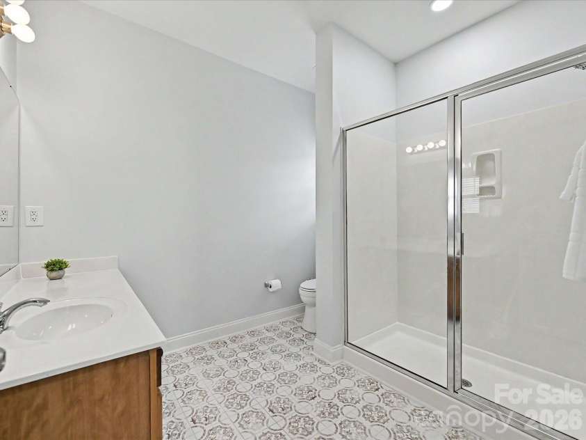 8007 Magna Lane, Indian Trail, NC 28079.  MLS# CAR4379280, YatesRealty ID 22765. Main Level Primary Bathroom