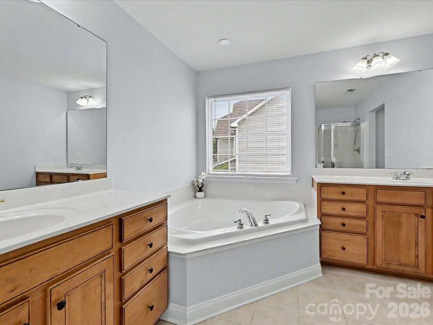 8007 Magna Lane, Indian Trail, NC 28079.  MLS# CAR4379280, YatesRealty ID 22765. Upstairs Primary Bathroom