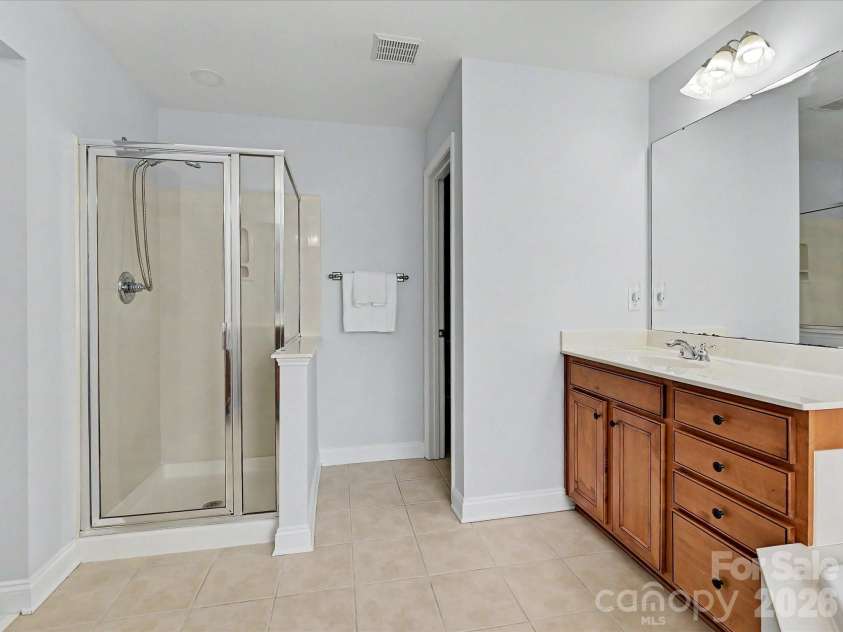 8007 Magna Lane, Indian Trail, NC 28079.  MLS# CAR4379280, YatesRealty ID 22765. Upstairs Primary Bathroom