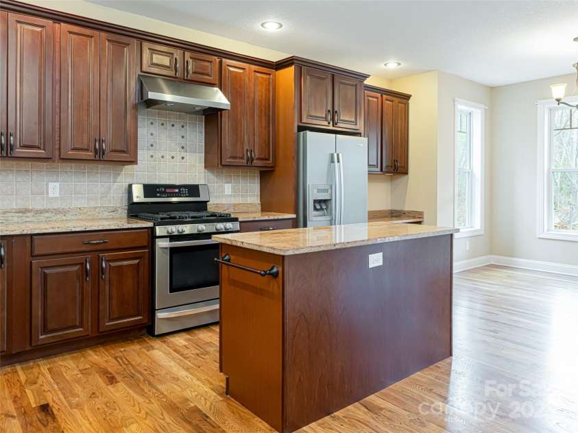 17 Bohemian Lane, Asheville, NC 28805.  MLS# CAR4243280, YatesRealty ID 22766. Kitchen island with space for a microwave