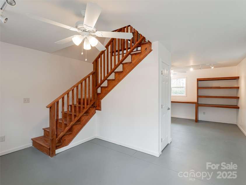 17 Bohemian Lane, Asheville, NC 28805.  MLS# CAR4243280, YatesRealty ID 22766. Stairs to second floor of the studio