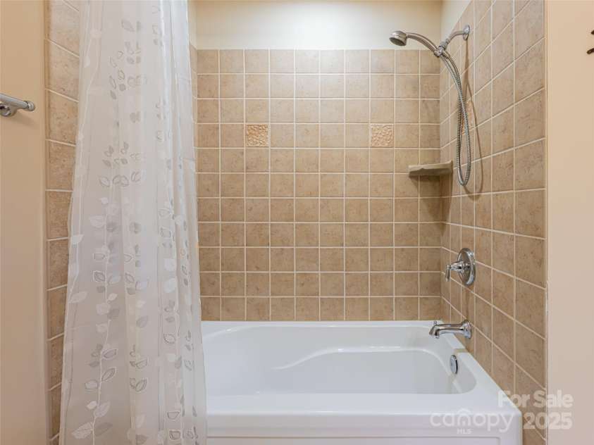 17 Bohemian Lane, Asheville, NC 28805.  MLS# CAR4243280, YatesRealty ID 22766. Tiled shower