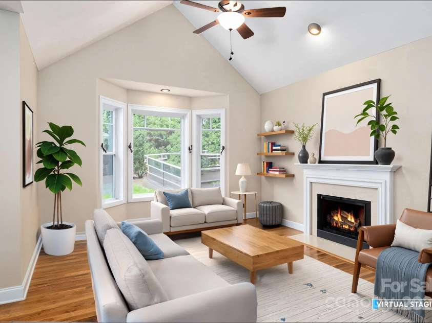 17 Bohemian Lane, Asheville, NC 28805.  MLS# CAR4293074, YatesRealty ID 22766. Gather Around the Fireplace