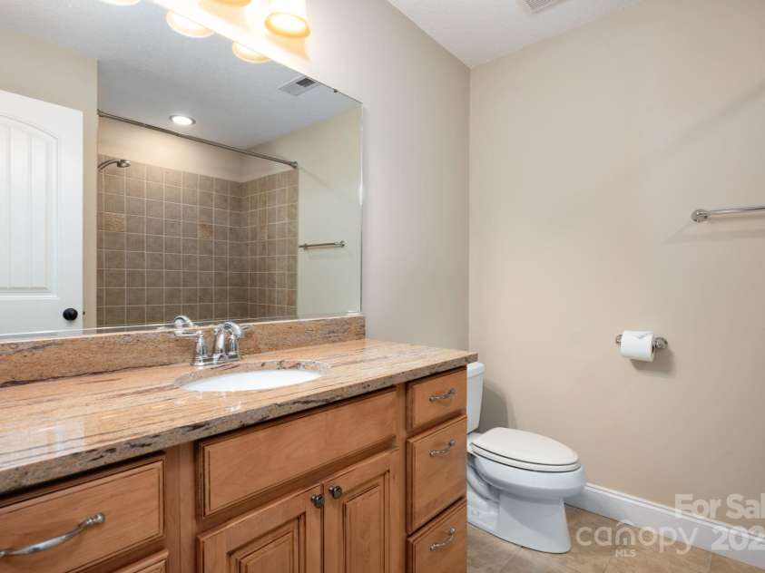 17 Bohemian Lane, Asheville, NC 28805.  MLS# CAR4293074, YatesRealty ID 22766. Second Bathroom has Granite Vanity
