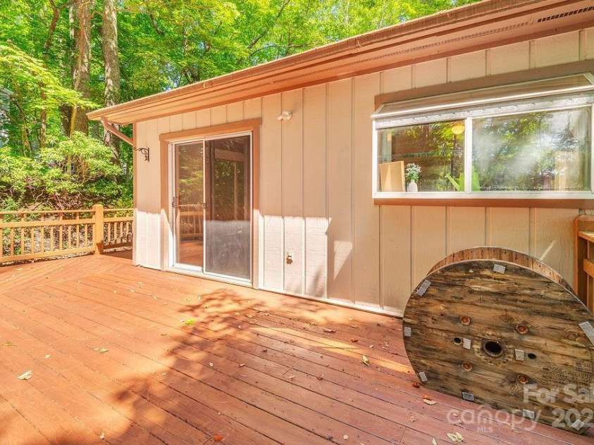 1 Spring Hill Drive, Hendersonville, NC 28792.  MLS# CAR4247945, YatesRealty ID 22767. Large Back Deck off of dining area