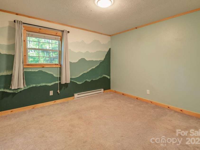 1 Spring Hill Drive, Hendersonville, NC 28792.  MLS# CAR4247945, YatesRealty ID 22767. Third Bedroom on main level