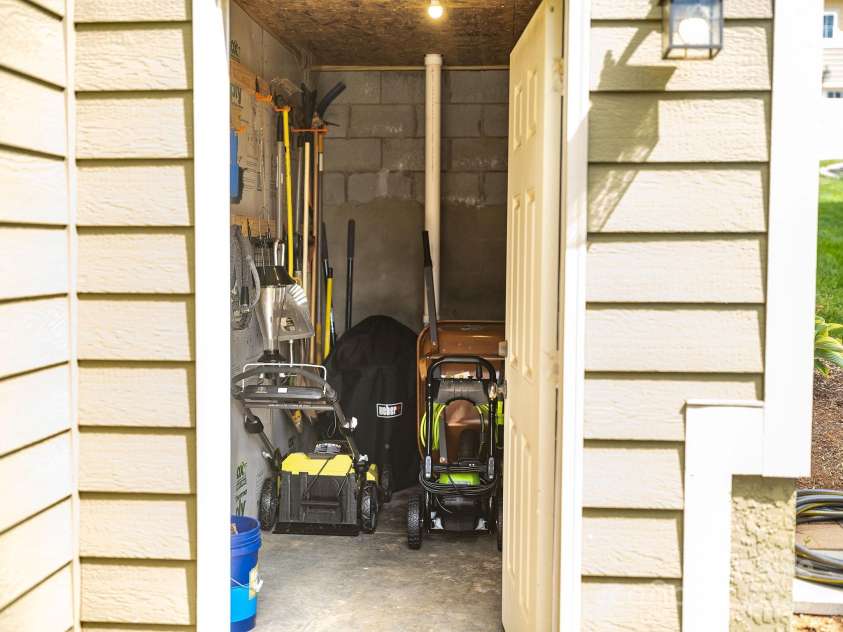 30 Asher Lane, Arden, NC 28704.  MLS# CAR4248571, YatesRealty ID 22768. Fantastic extra storage room on the back of the house! 