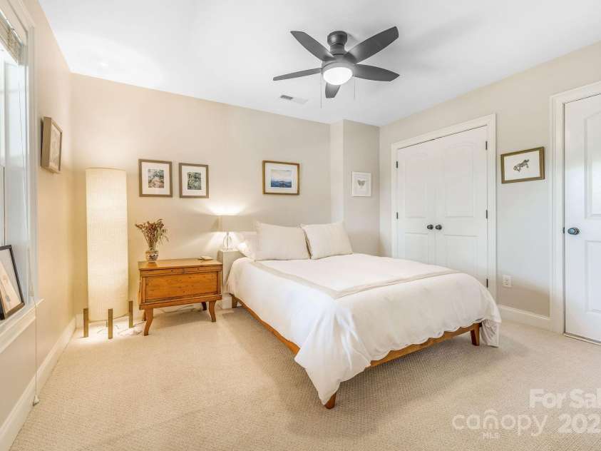 30 Asher Lane, Arden, NC 28704.  MLS# CAR4248571, YatesRealty ID 22768. Guest bedroom with ample space. 