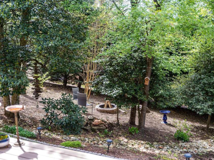 30 Asher Lane, Arden, NC 28704.  MLS# CAR4248571, YatesRealty ID 22768. The back yard is a nature haven! 