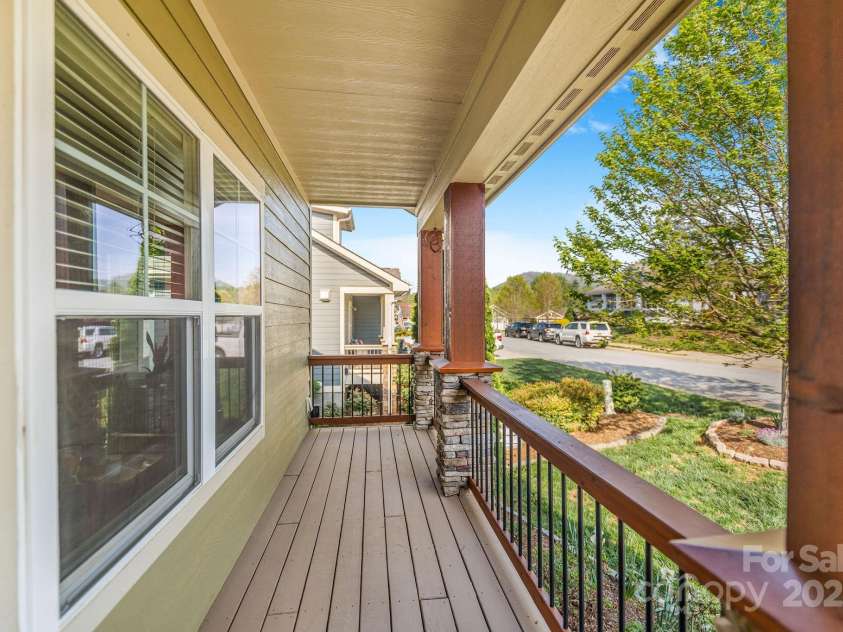 30 Asher Lane, Arden, NC 28704.  MLS# CAR4248571, YatesRealty ID 22768. There is space to sit on the front porch too! 