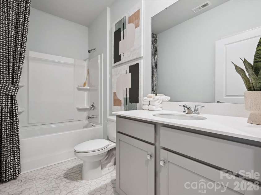 5036 Puddle Pond Road, Indian Trail, NC 28079.  MLS# CAR4382863, YatesRealty ID 22775. Photo of Model home for representational purposes
