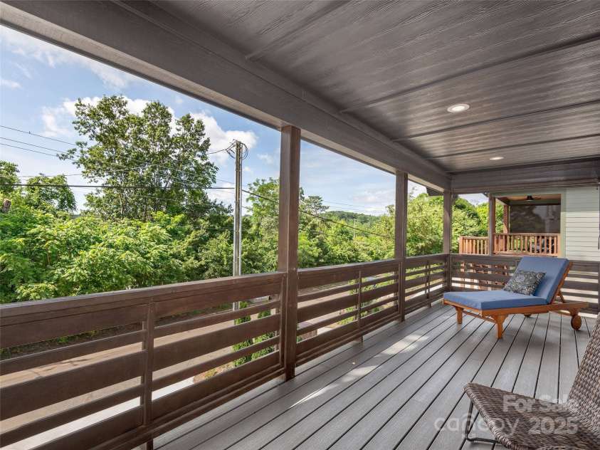156 Joyner Avenue, Asheville, NC 28806.  MLS# CAR4273987, YatesRealty ID 22779. Covered deck off primary