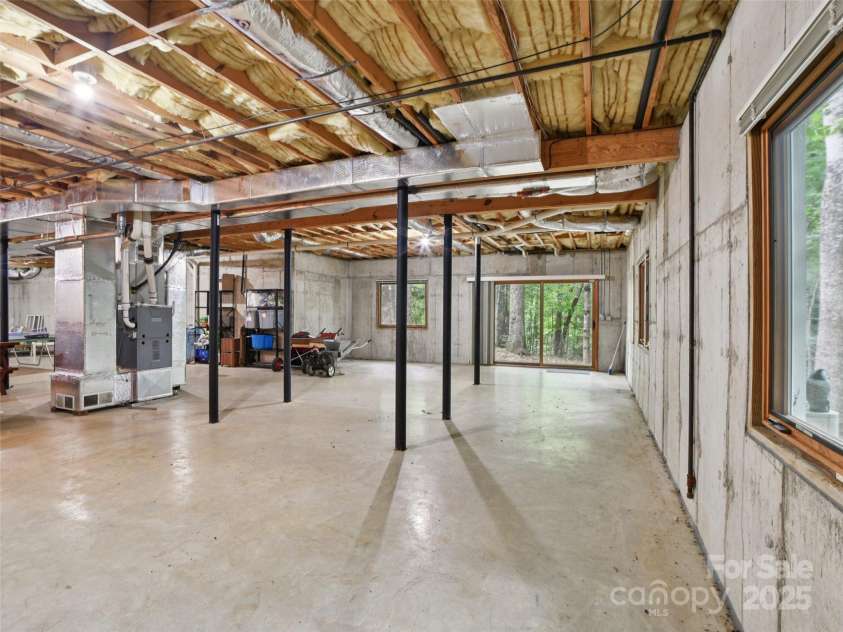 105 Sunningdale Drive, Flat Rock, NC 28731.  MLS# CAR4274018, YatesRealty ID 22781. Basement with Poured Concrete Walls
