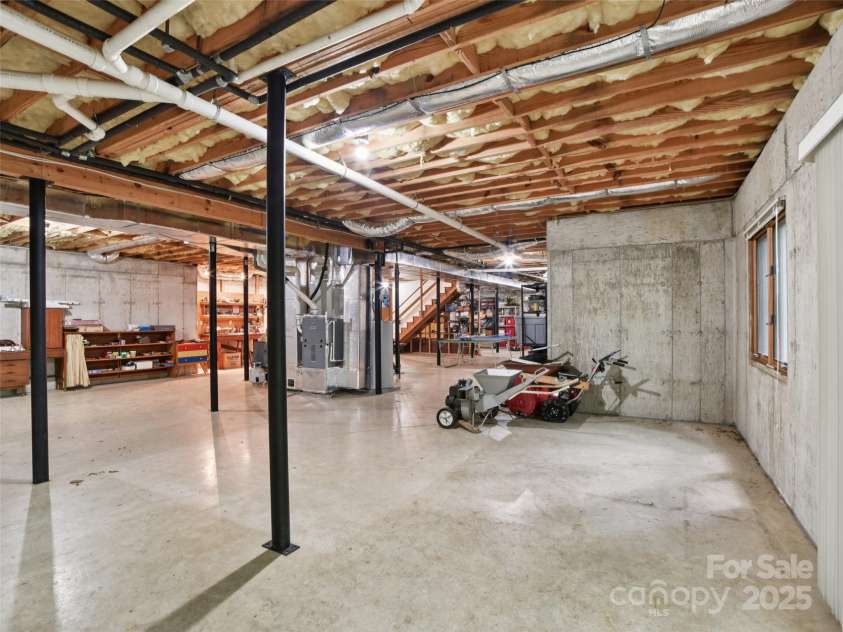 105 Sunningdale Drive, Flat Rock, NC 28731.  MLS# CAR4274018, YatesRealty ID 22781. Basement with Poured Concrete Walls