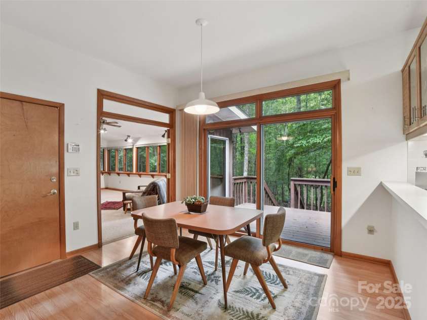 105 Sunningdale Drive, Flat Rock, NC 28731.  MLS# CAR4274018, YatesRealty ID 22781. Breakfast Area off Kitchen and Sunroom