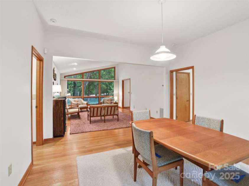 105 Sunningdale Drive, Flat Rock, NC 28731.  MLS# CAR4274018, YatesRealty ID 22781. Dining Room connected to Living Room