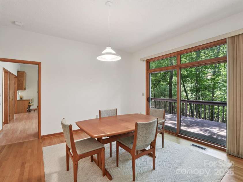 105 Sunningdale Drive, Flat Rock, NC 28731.  MLS# CAR4274018, YatesRealty ID 22781. Dining Room connected to Living Room