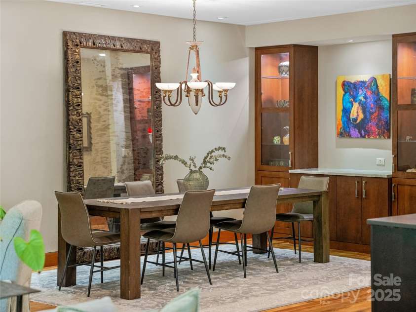 3 Turkey Roost Court, Fairview, NC 28730.  MLS# CAR4273755, YatesRealty ID 22782. Dining area with builtins