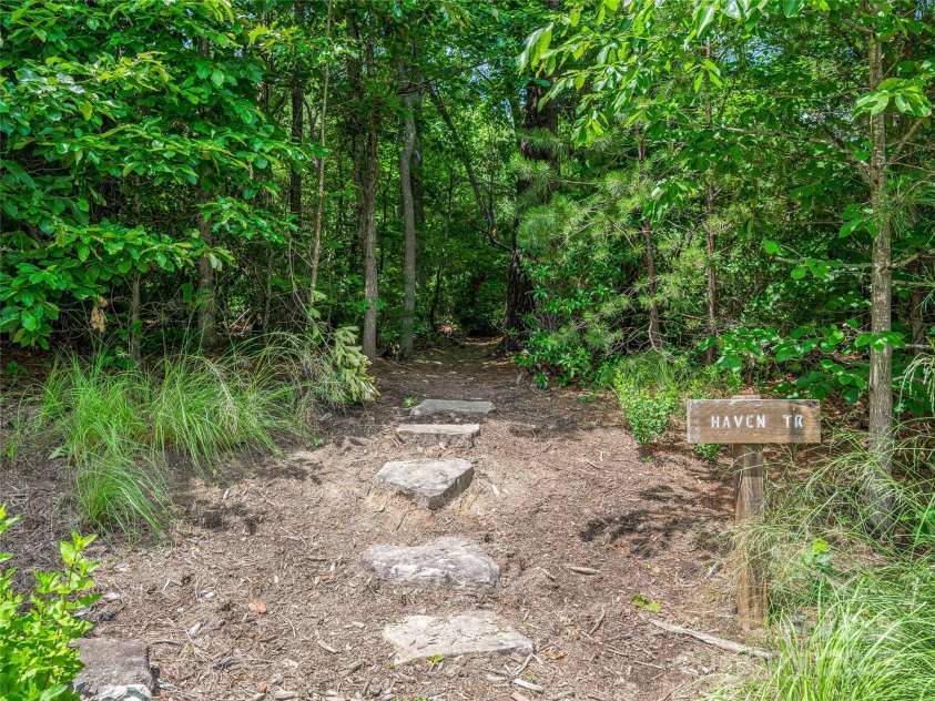 3 Turkey Roost Court, Fairview, NC 28730.  MLS# CAR4273755, YatesRealty ID 22782. Property boarders community land and trail system