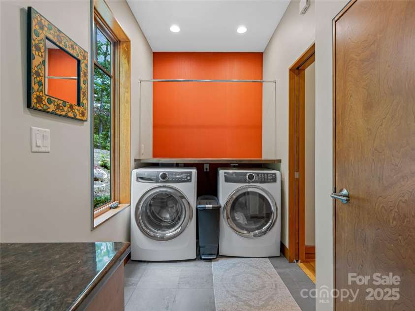 3 Turkey Roost Court, Fairview, NC 28730.  MLS# CAR4273755, YatesRealty ID 22782. Spacious Laundry room and storage.  Cleaning sink is in storage area.