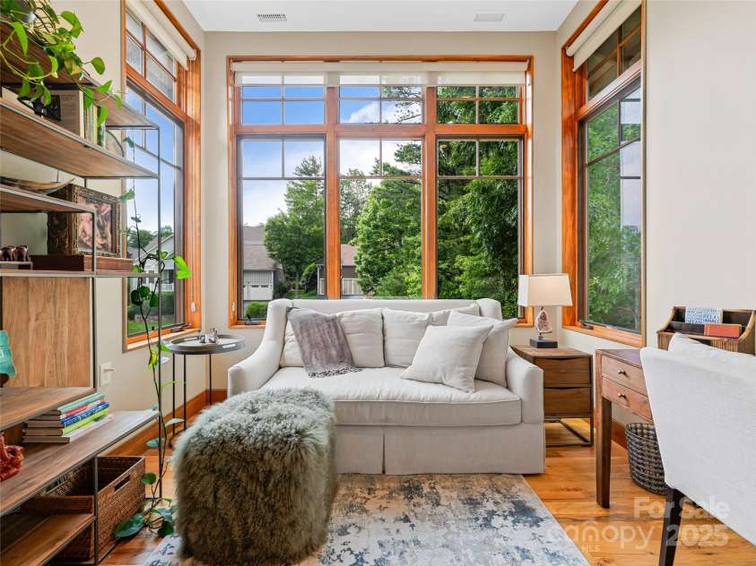 3 Turkey Roost Court, Fairview, NC 28730.  MLS# CAR4273755, YatesRealty ID 22782. Sunroom - walls of windows