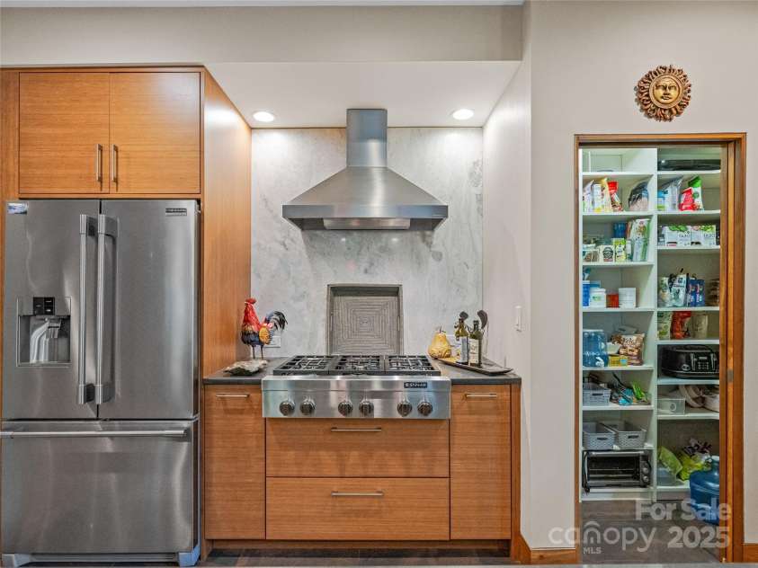 3 Turkey Roost Court, Fairview, NC 28730.  MLS# CAR4273755, YatesRealty ID 22782. Walk in Pantry is addition to all the cabinet storage