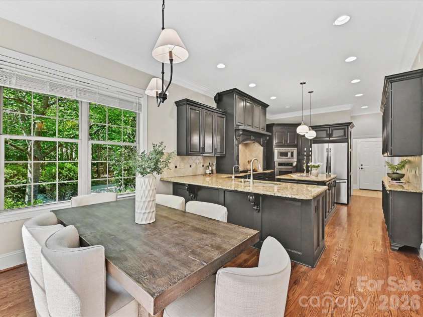 1023 Trinity Ridge Parkway, Fort Mill, SC 29715.  MLS# CAR4372318, YatesRealty ID 22784. Entertain effortlessly in this expansive gourmet chef’s kitchen.