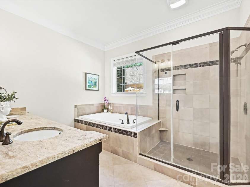 1023 Trinity Ridge Parkway, Fort Mill, SC 29715.  MLS# CAR4372318, YatesRealty ID 22784. Spa-like bath with soaking tub and oversized shower.