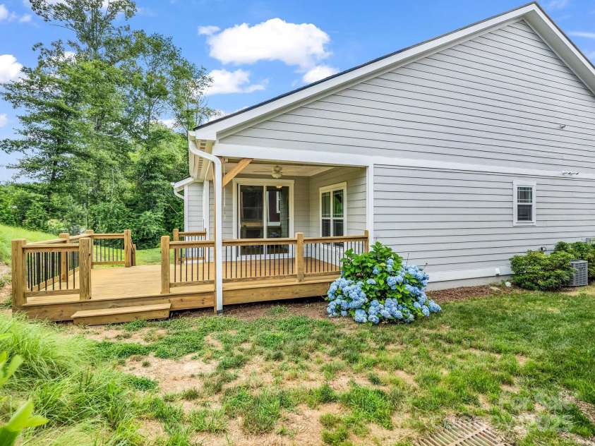 62 Leyland Circle, Hendersonville, NC 28792.  MLS# CAR4270363, YatesRealty ID 22784. Access off back deck to both sides of the yard.