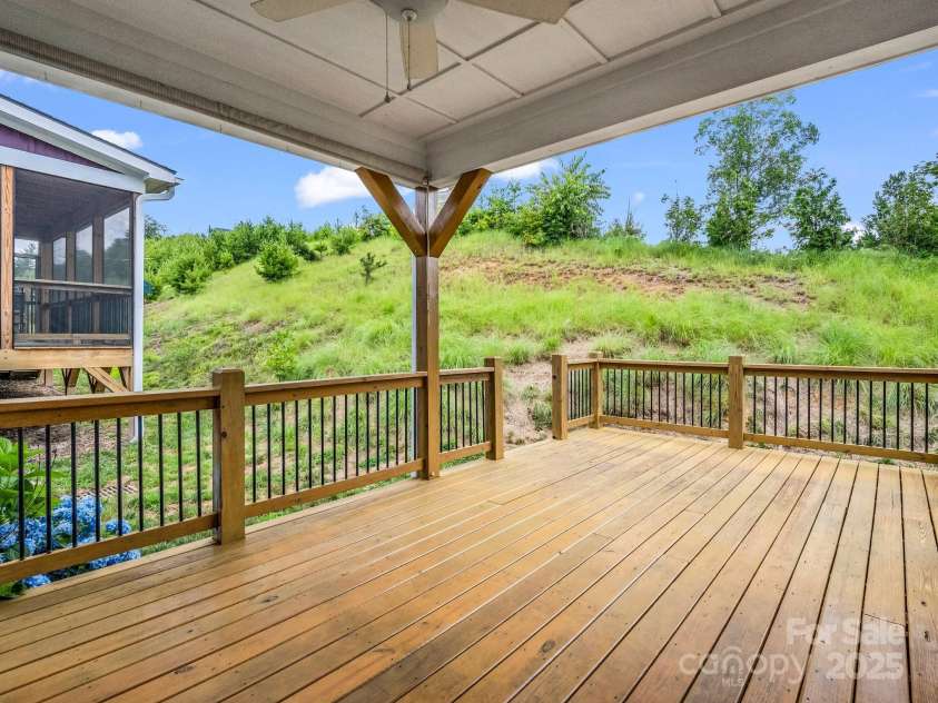 62 Leyland Circle, Hendersonville, NC 28792.  MLS# CAR4270363, YatesRealty ID 22784. Back deck has pull down shade for privacy.