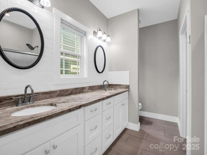 62 Leyland Circle, Hendersonville, NC 28792.  MLS# CAR4270363, YatesRealty ID 22784. Primary Bedroom with Walk-In Closet