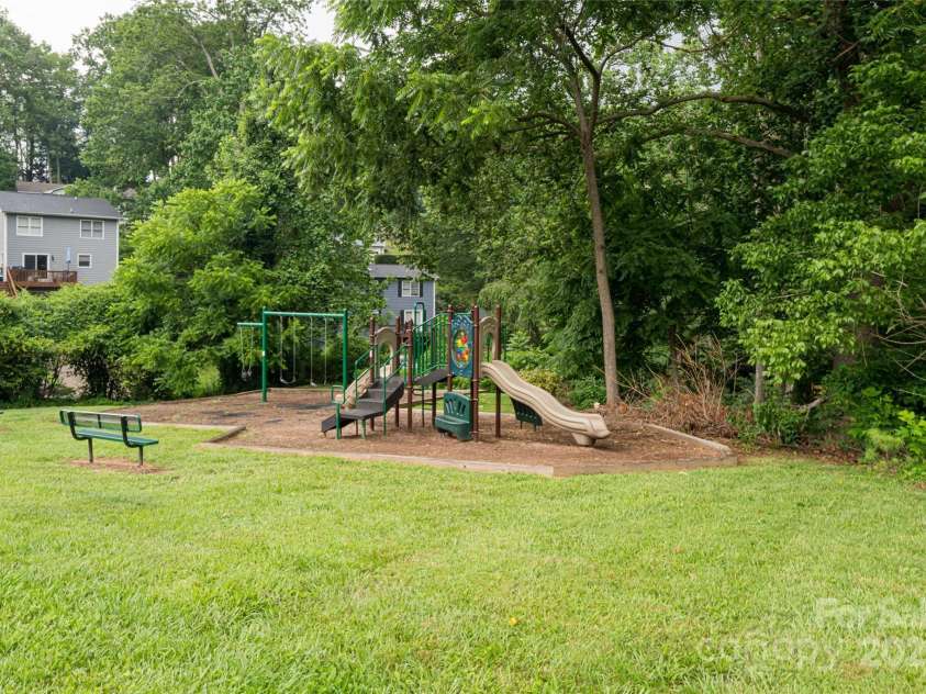106 Goldfinch Lane, Asheville, NC 28803.  MLS# CAR4274925, YatesRealty ID 22785. Community playground