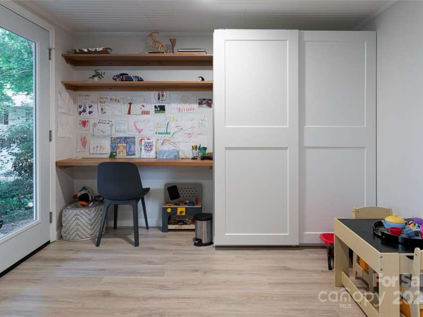 106 Goldfinch Lane, Asheville, NC 28803.  MLS# CAR4274925, YatesRealty ID 22785. Lower Level Bedroom