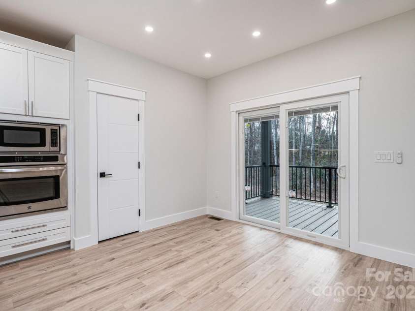 1328 33rd Avenue Drive, Hickory, NC 28601.  MLS# CAR4327859, YatesRealty ID 2279. Breakfast Area showing the Sliding Patio Doors leading to the covered back porch..