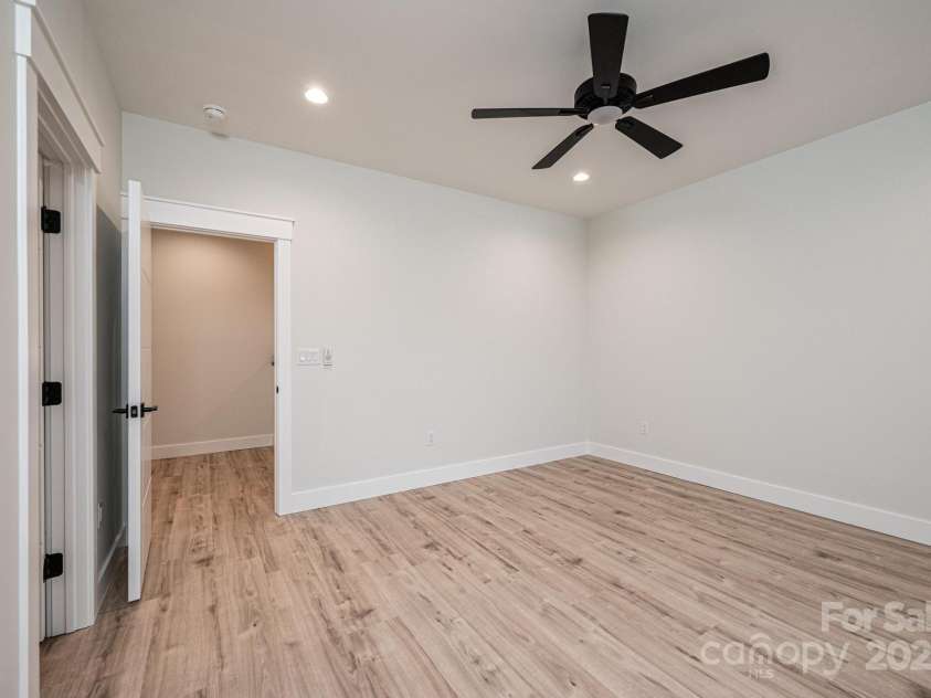 1328 33rd Avenue Drive, Hickory, NC 28601.  MLS# CAR4327859, YatesRealty ID 2279. Upstairs #3 Bedroom with Ceiling Fan and Walk in Closet